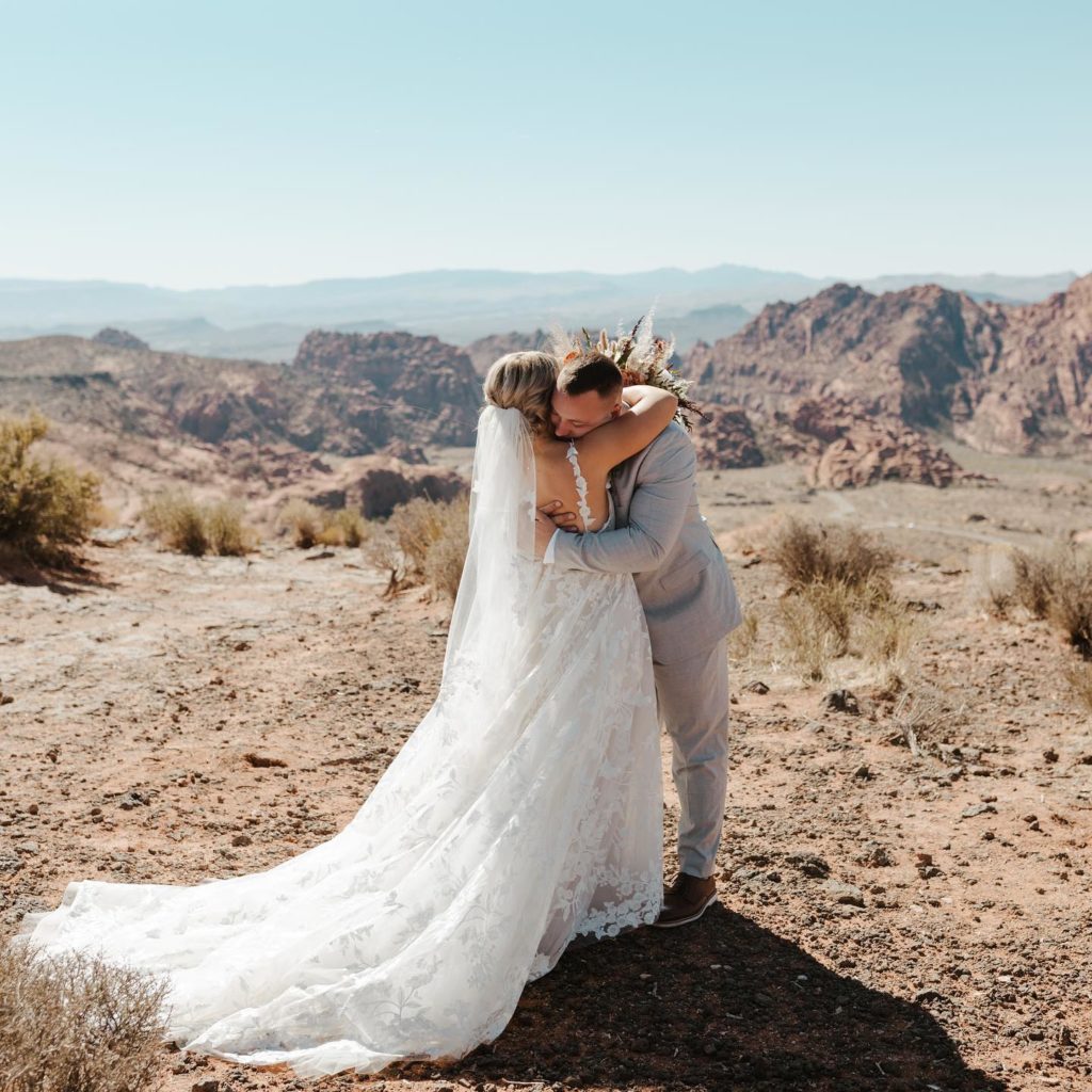 Bride and groom share an intimate moment during their destination wedding in St. George, Utah. A very emotional groom to say the least!